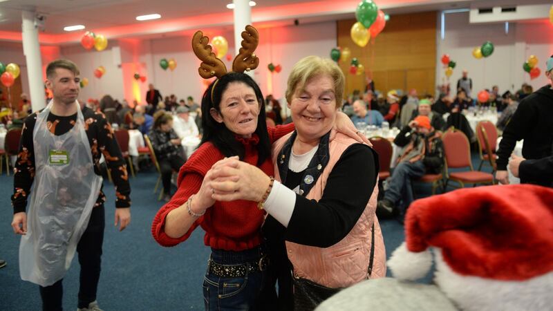Sr Julie Doran dancing with Sandra at the Knights of Columbanus Christmas dinner, in the RDS Dublin. Photograph: Dara Mac Dónaill / The Irish Times