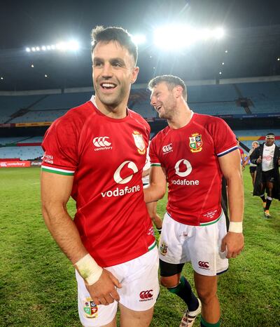 Conor Murray celebrates with Dan Biggar after the victory over the Sharks in Loftus Versfeld Stadium, Pretoria during the Lions tour to South Africa in 2021. Photograph: Dan Sheridan/Inpho