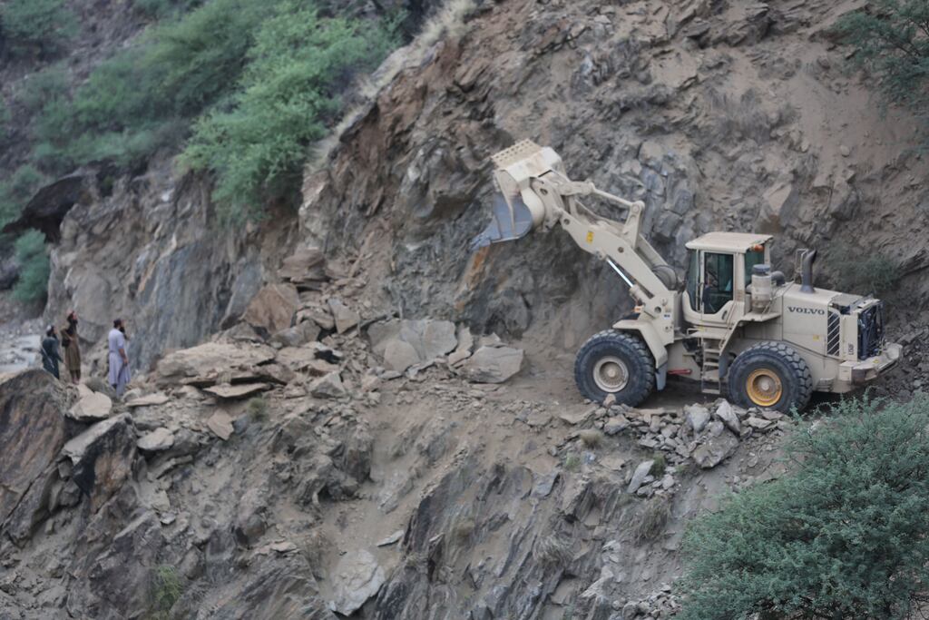 Rescue officials remove landslides from an affected area after the earthquake in Kunar, Afghanistan. Photograph: EPA