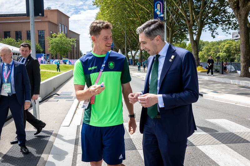 Taoiseach Simon Harris on a visit to the Olympic Village meets Ryan Mullen. Photograph: Morgan Treacy/Inpho