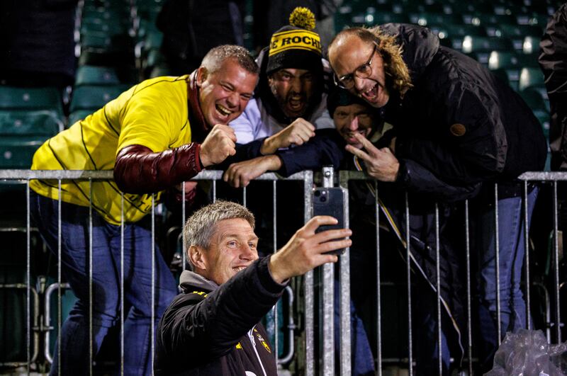 La Rochelle fans enjoy a shot with Ronan O'Gara tduring La Rochelle's match against Bath in December. Photograph: Bob Bradford/CameraSport via Getty Images