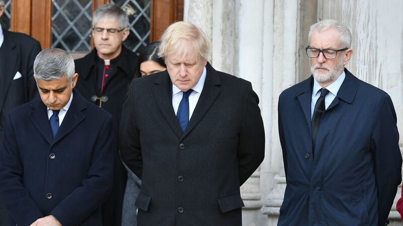 Mayor of London Sadiq Khan, British prime minister Boris Johnson and Labour leader Jeremy Corbyn take part in a vigil in Guildhall Yard, London. Photograph: Dominic Lipinski/PA Wire