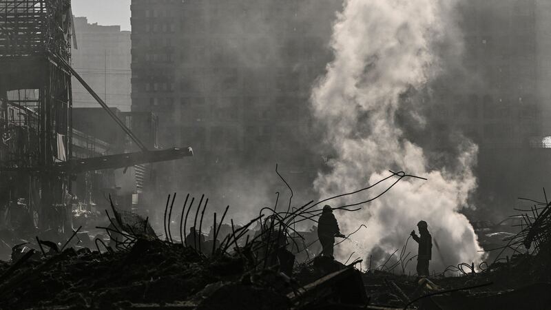 Firefighters douse the fire in the Retroville shopping mall after a Russian attack on the northwest of the capital Kyiv on Monday. Photograph: AFP via Getty Images