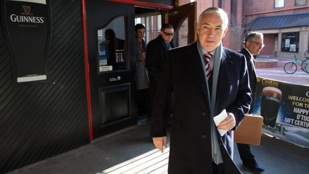 Seán Dunne walks out of O’Tooles Irish pub after a lunch break during a meeting with creditors at the Federal Court in New Haven, Connecticut, last week. Photograph: Steve Miller