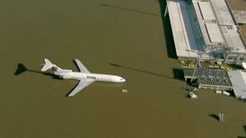 Airports and stadiums under water as deadly floods hit southern Brazil