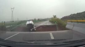 Dashcam footage captures car driving off of collapsed Chinese bridge