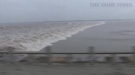 Tidal bore: thousands wowed by natural river phenomenon