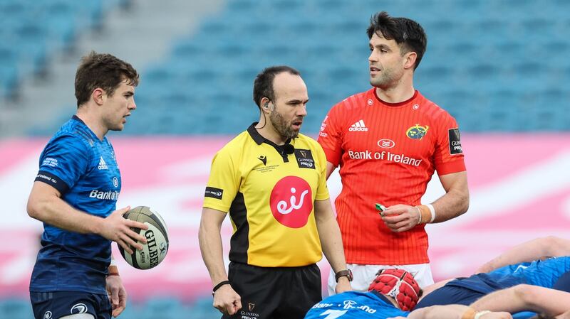 Referee Mike Adamson waits in Leinster’s Luke McGrath to feed the scrum as Munster’s Conor Murray looks on during the Guinness Pro 14 Final at the RDS. Photograph: Billy Stickland/Inpho