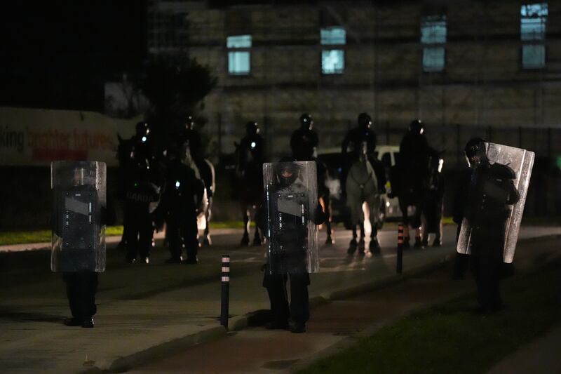 Gardaí block protesters on a road in Saggart, backed up by the mounted unit. Photograph: Niall Carson/PA Wire