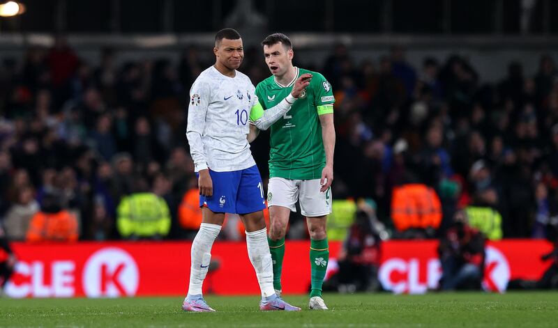 France's Kylian Mbappé with Seamus Coleman of Ireland. Photograph: Ryan Byrne/Inpho