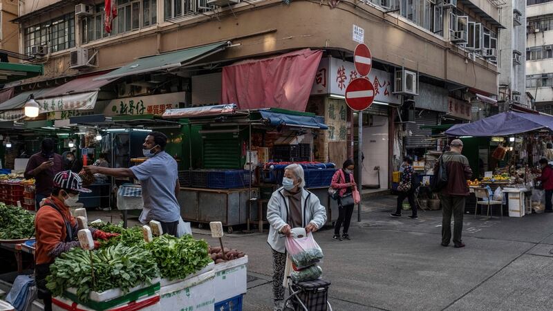 Shoppers at a market in Jordan, a working-class neighbourhood in Hong Kong. Photograph: Lam Yik Fei/The New York Times