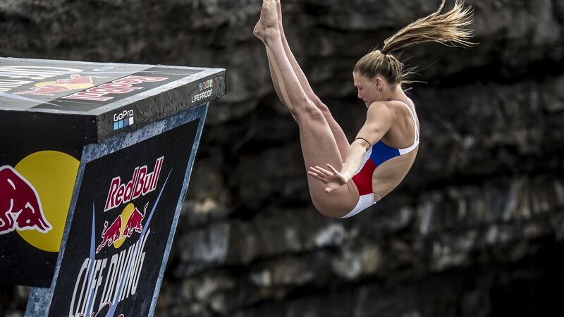 Eleanor Townsend Smart of the USA dives from the 21 metre platform during the first stop of the Red Bull Cliff Diving World Series at the Serpent`s Lair, Inis Mor. Photograph: Inpho