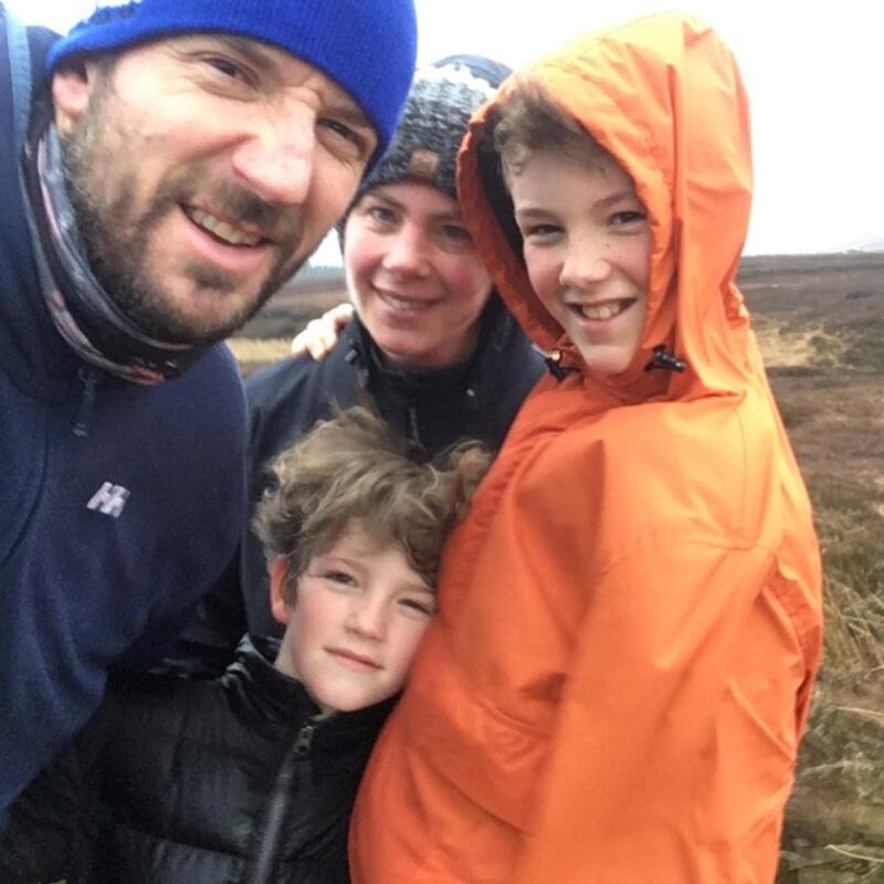 Catherine Cosgrave with her husband and sons.
