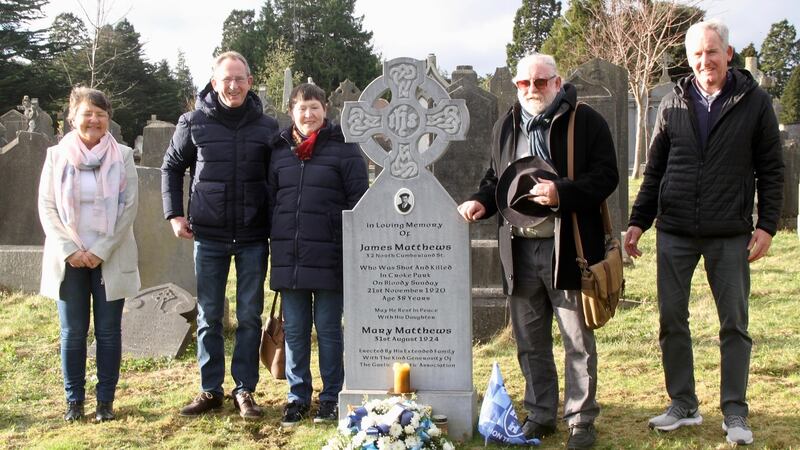Relatives of James Matthews visit his grave in Glasnevin Cemetery