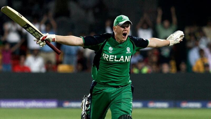 Kevin O’Brien celebrates a century during Ireland’s shock victory over England at the 2011 Cricket World Cup in Bangalore, India. Photograph: Graham Crouch/Getty Images
