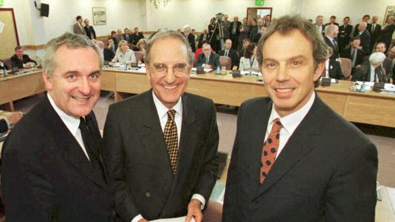 Taoiseach Bertie Ahern, US senator George Mitchell and British prime minister Tony Blair. Photograph: Dan Chung//AFP/Getty 