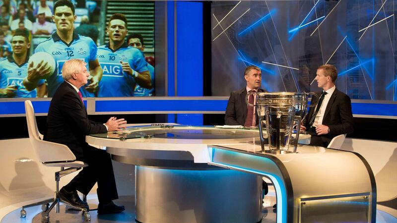 Michael Lyster with  Liam Sheedy and Henry Shefflin. Photograph: Morgan Treacy/Inpho