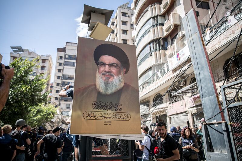 A poster of assassinated Hizbullah leader Hassan Nasrallah in Beirut's southern suburbs. Photograph: Sally Hayden. 