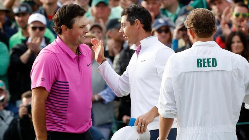 Rory McIlroy congratulates Patrick Reed after he won  the 2018 Masters tournament  in Augusta, Georgia. Photograph:  Mike Segar/Reuters