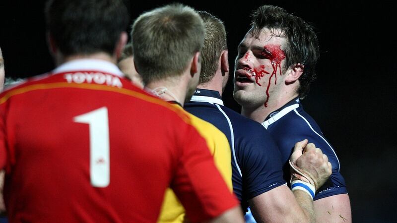 Leinster’s Cian Healy  looks to get even with John Hayes after taking a shoeing in their 2009 clash. Photograph: Billy Stickland/Inpho
