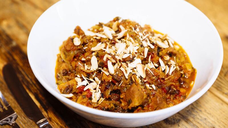 Lamb with almonds and raisins. Photograph: Emma Jervis
