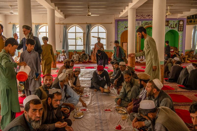 Residents hold a funeral on Wednesday for the four people who died in the flash floods from Tahi Qamar village, in Shinwari, eastern Afghanistan. Photograph: Kiana Hayeri/New York Times