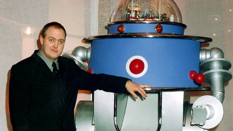 Dara Ó Briain with Shredder the robot in the RTÉ quiz show It’s a Family Affair