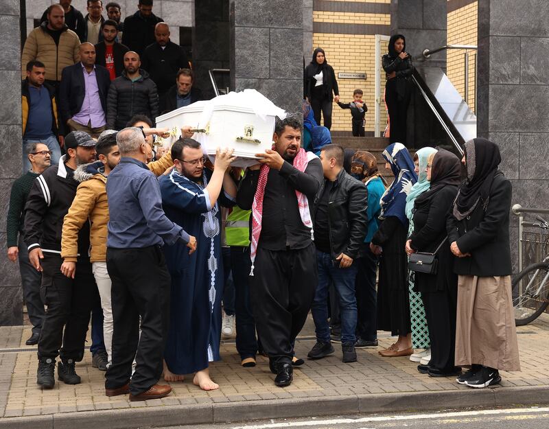 The coffin of Dlava Mohamed (16) is carried from Clonskeagh Mosque in Dublin after her funeral on Thursday. Photograph: Damien Eagers/PA Wire