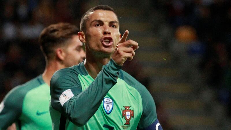 Portugal’s Cristiano Ronaldo celebrates scoring their first goal in the Group B World Cup qualifier against Latvia at the  Skonto Stadium in Riga. Photograph: Kacper Pempel/Reuters