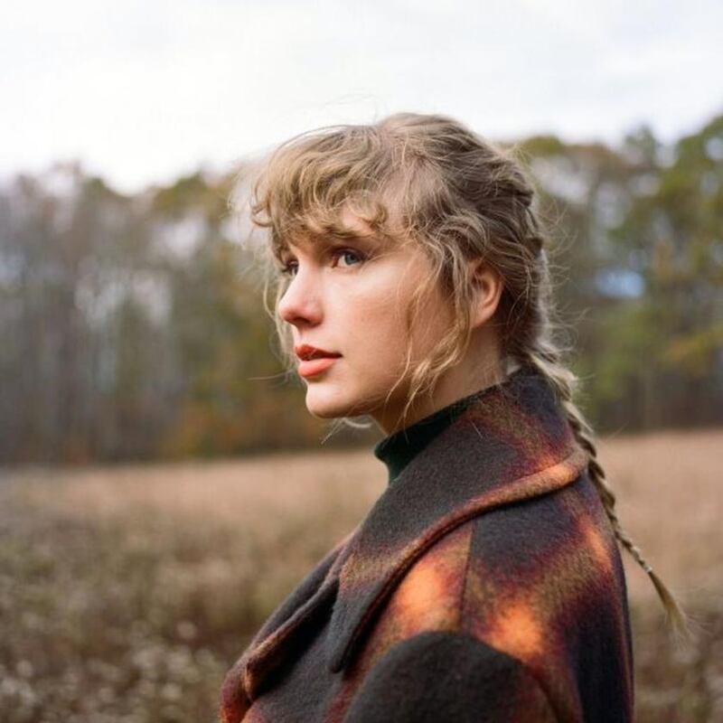 Four months after releasing the inward-gazing Folklore, Swift surprised fans with Evermore. Photograph: Beth Garrabrant