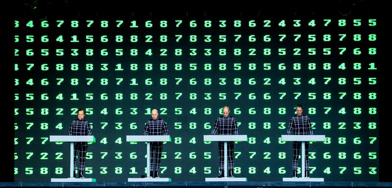 Ralf Hütter, Fritz Hilpert, Henning Schmitz and Falk Grieffenhagen of Kraftwerk perform at Trinity College Dublin. Photograph: Tom Honan