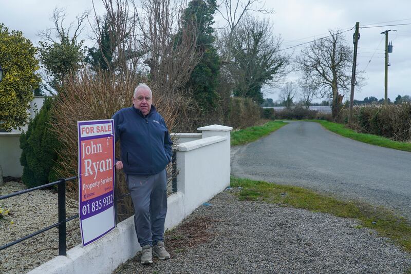 Paul McCue outside his home near Ashbourne in Co Meath which is now surrounded by a solar farm over the last few years. He is struggling to sell the property. Photograph: Enda O'Dowd