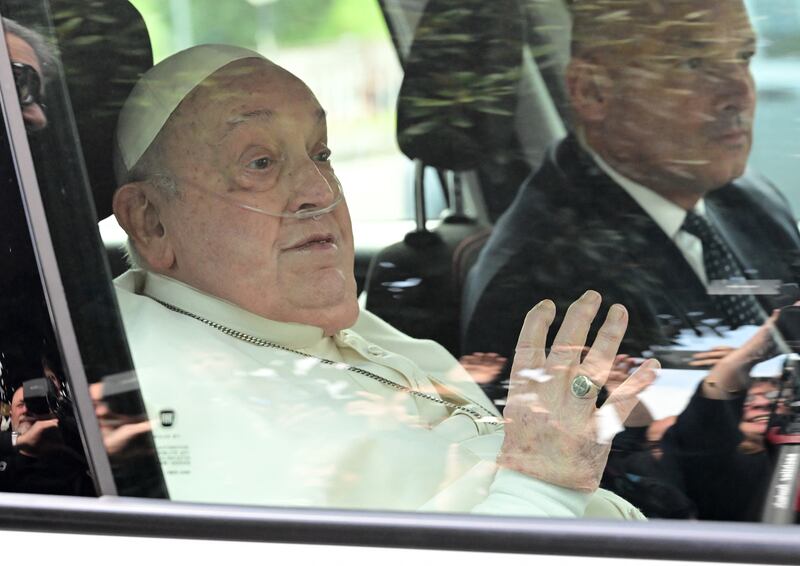 Pope Francis waves as he leaves the Gemelli hospital on Sunday. Photograph: Tiziana Fabi/AFP via Getty Images.