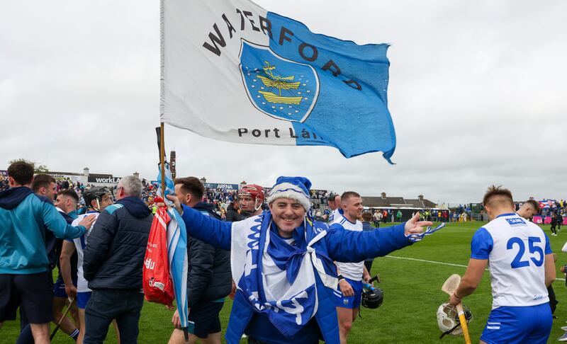 A Waterford fan celebrates after the win over Clare at Walsh Park on Sunday. Photograph: Natasha Barton/Inpho 