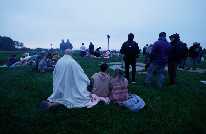 People wrap up well for the occasion despite the midsummer date.  Photograph: Alan Betson/The Irish Times

