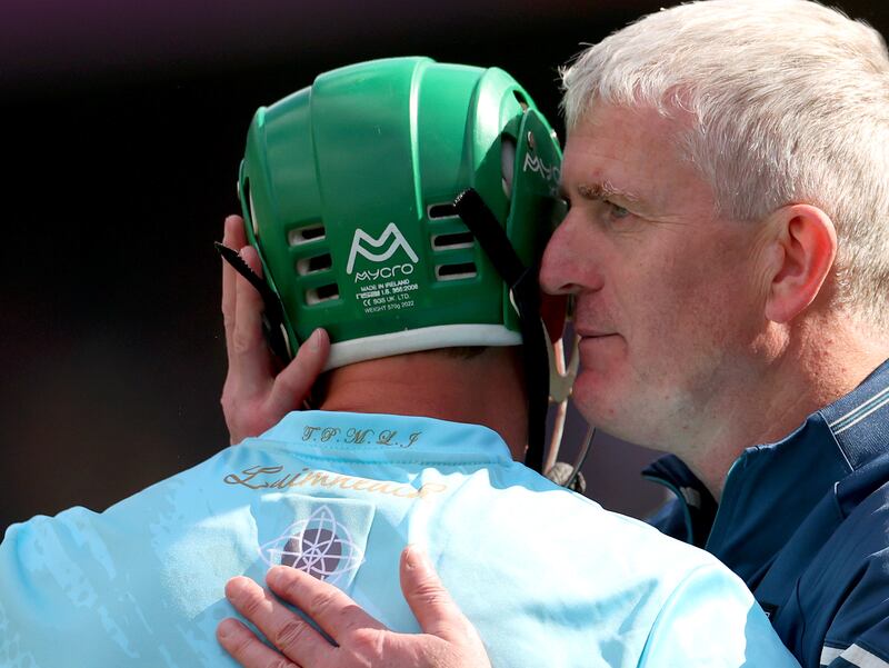 Limerick’s goalkeeper Nickie Quaid consoled by manager John Kiely. Photograph: James Crombie/Inpho