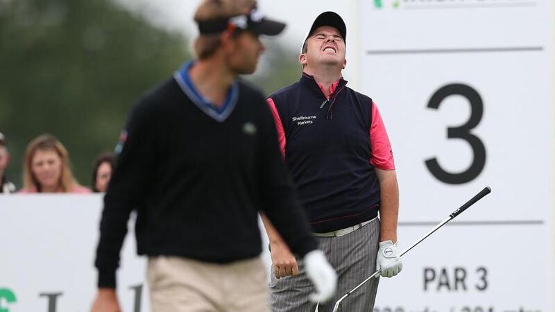 Shane Lowry reacts after a bad drive during day three of the Irish Open at Carlton House Golf Club, Co. Kildare, Republic of Ireland. PRESS ASSOCIATION Photo. Picture date: Saturday June 29, 2013. See PA story GOLF Irish. Photo credit should read: Julien Behal/PA Wire. RESTRICTIONS: Use subject to restrictions. Editorial use only. No commercial use. Call +44 (0)1158 447447 for further information.