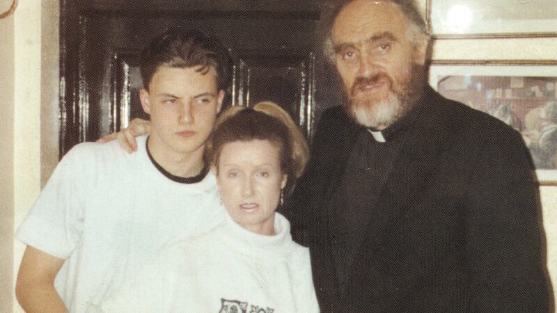 Fr Michael Cleary with Phylis Hamilton and their son Ross: We hold within living memory the savagely misogynistic culture presided over by clerics, politicians, medics and pillars of society.