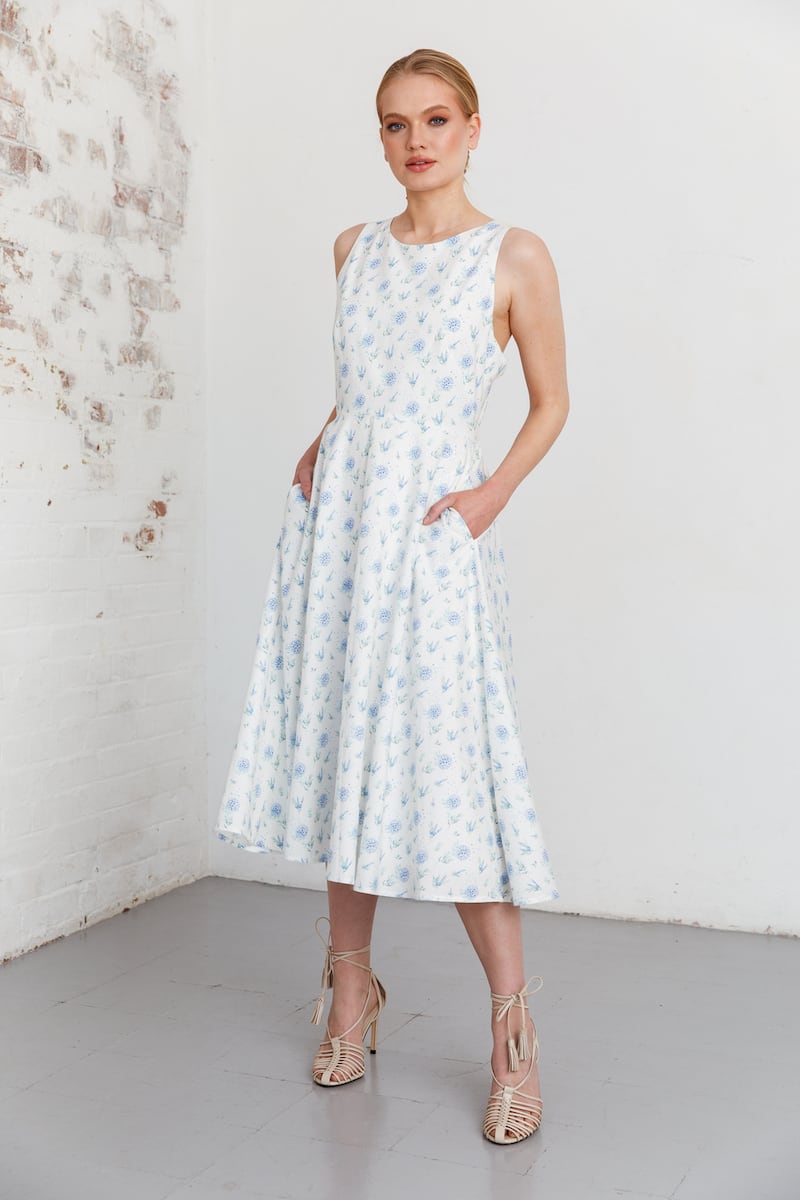 Hand-painted floral midi in organic cotton with full skirt and pockets €325