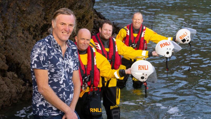 Michael Power with Tramore RNLI Inshore Lifeboat crew David and Fergal McGrath and Alec Fitzmaurice. Photograph: Patrick Browne