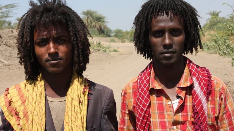 Young Afar men without the weapons often carried by many. Photograph: James Jeffrey
