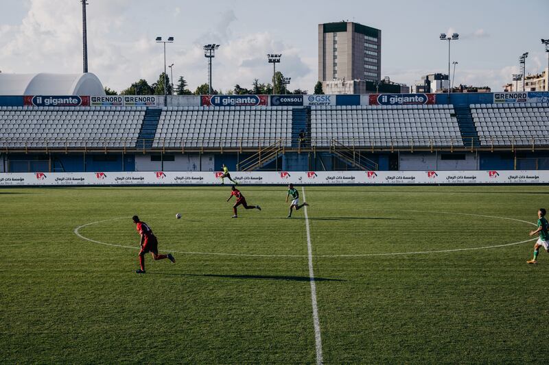 Libyan teams Al Ahly Tripoli, in white shorts, and Al Ittihad, held behind closed doors in Milan. Photograph: Camilla Ferrari/The New York Times
                      