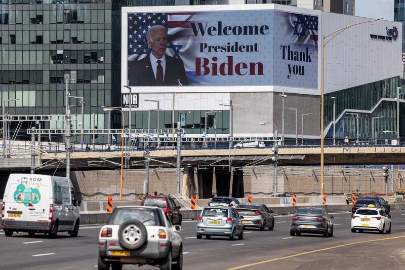 Traffic drives past a billboard in Tel Aviv welcoming US president Joe Biden, who arrived in Israel following Hamas's attacks that have led to major Israeli reprisals. Photograph: AHMAD GHARABLI/AFP via Getty Images