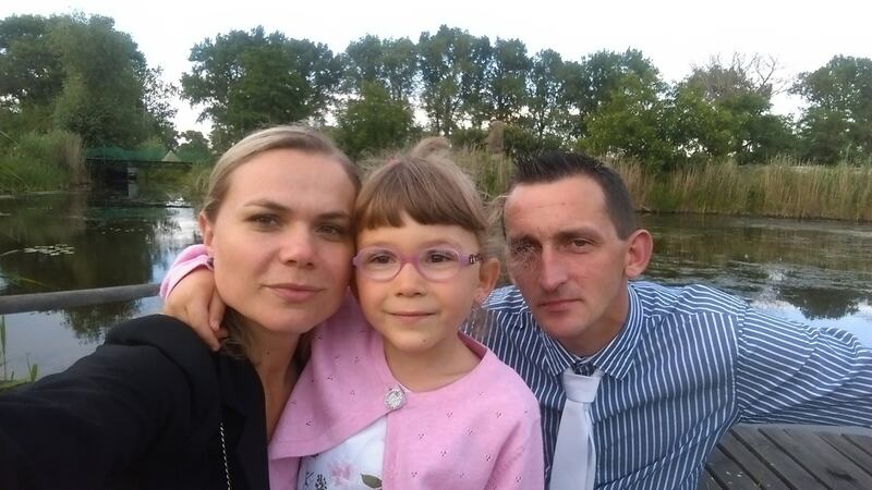 Katarzyna Kielbasa, who loves Ireland for its landscape, with   daughter Molly and partner  Bartosz Wozny.