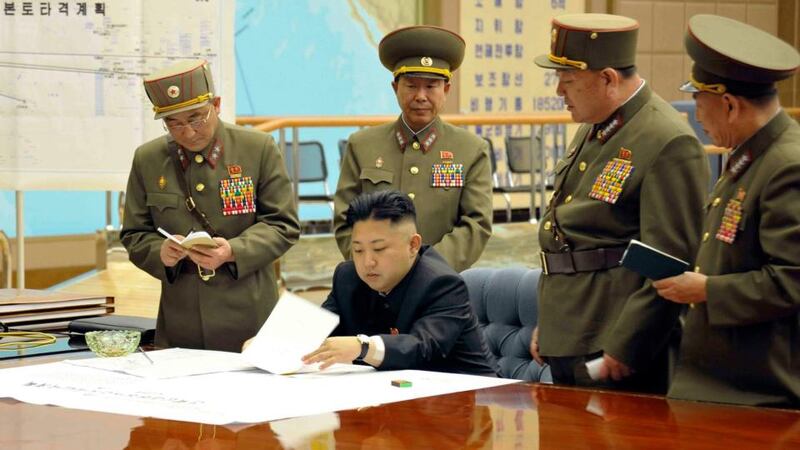 North Korean leader Kim Jong-un (centrte) presides over an urgent operation meeting on the Korean People's Army Strategic Rocket Force's performance of duty for firepower strike at the Supreme Command in Pyongyang, last week, in this picture released by the North's official KCNA news agency. Photograph: KCNA/Reuters