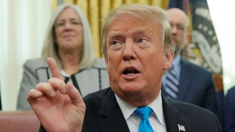 Donald Trump: in a sense his wall is just another drug. For his fans, it is a fix of xenophobia that dulls the pain of the real epidemic that is blighting their lives and their own communities. Photograph: Jim Young/Reuters