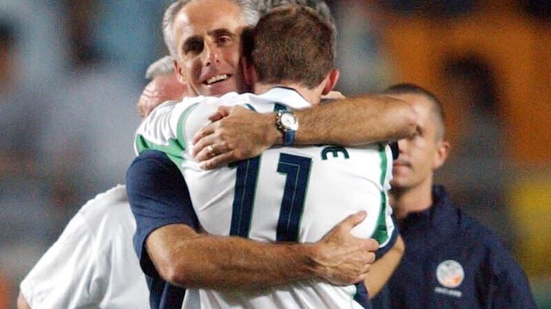 Mick McCarthy consoles Kevin Kilbane in  2002: his salary will be  about €1.2 million a year, with significant bonuses built in. Photograph: PA Photo/Toby Melville