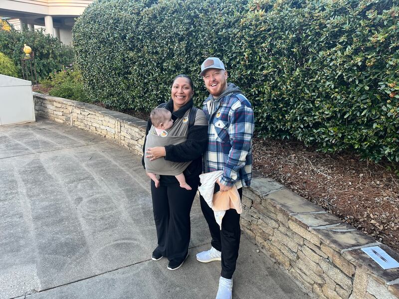 Kris and Thalia brought their four-month-old daughter Soleil when they went to vote at Dunwoody library in Atlanta, Georgia. Photograph: Steven Carroll