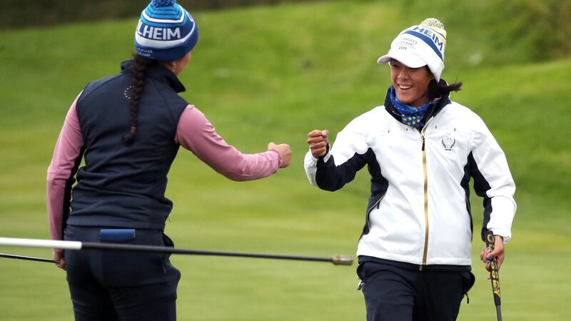 Europe’s Celine Boutier (right) celebrates her eagle putt on the 14th with Georgia Hall during the afternoon fourball match on day two of the  Solheim Cup at Gleneagles Golf Club in  Auchterarder, Scotland. Photograph:  Jane Barlow/PA Wire