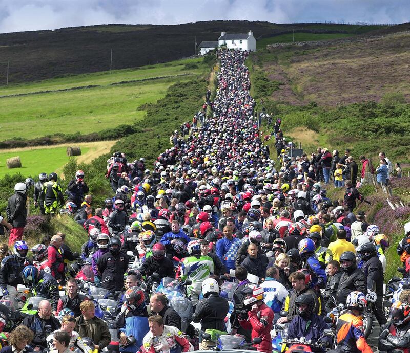 Thousands of motorcycle racing fans paid tribute to Joey Dunlop after his death in Estonia in July 2000 during a special parade lap at the Manx Grand Prix later that summer. Photograph: Stephen Davison/Pacemaker